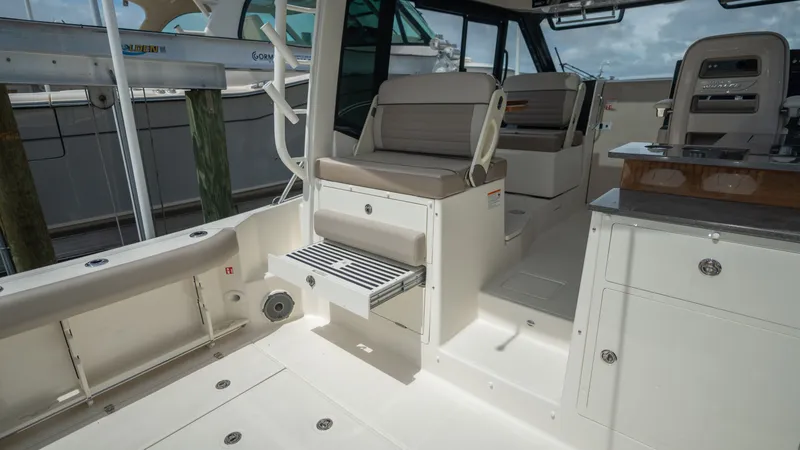 Slide: The Image of Interior of 2026 Boston Whaler 365 Conquest with seating area. - 39