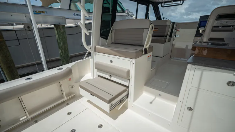 Slide: The Image of Interior of 2026 Boston Whaler 365 Conquest with seating area. - 40
