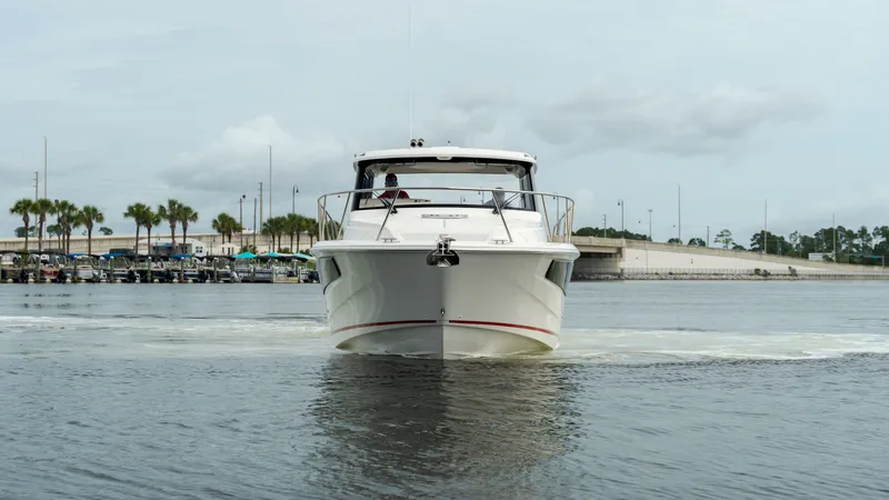 Slide: The Image of 2026 Boston Whaler 365 Conquest on calm waters. - 6