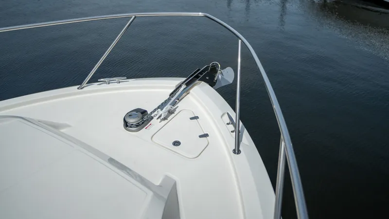 Slide: The Image of Bow of 2026 Boston Whaler 365 Conquest with anchor and railing. - 8