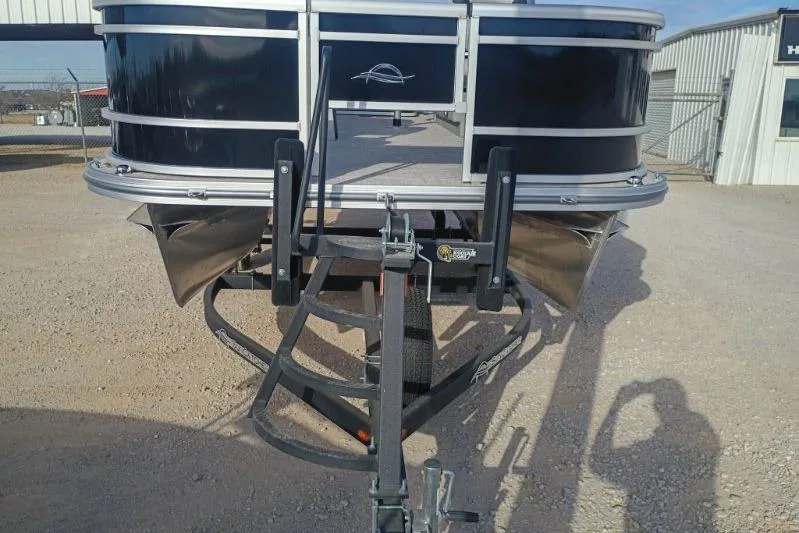 Slide: The Image of 2026 SunCatcher Select 18F pontoon boat front view on trailer. - 10
