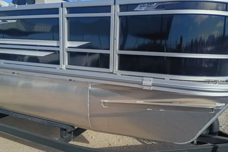 Slide: The Image of 2026 SunCatcher Select 18F pontoon boat, sleek design with aluminum siding. - 9