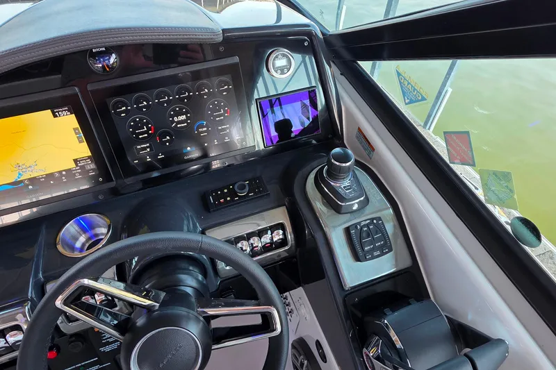 Slide: The Image of 2026 Formula 350 Crossover Bowrider I/O dashboard with advanced navigation and control systems. - 13