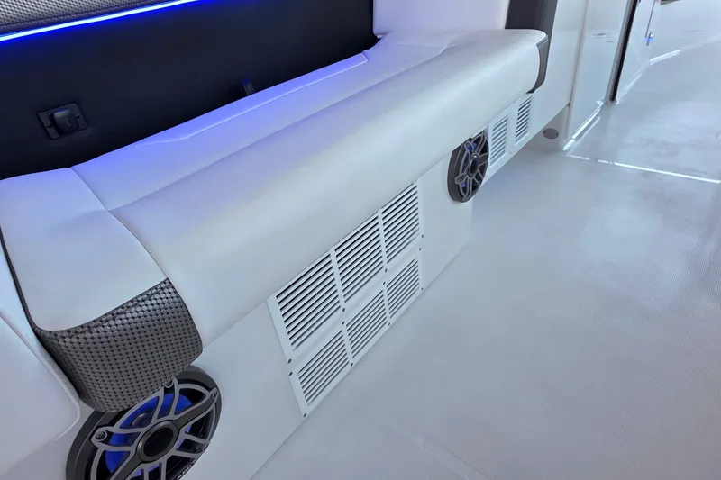 Slide: The Image of Interior of 2026 Formula 350 Crossover Bowrider I/O with sleek seating and modern speaker system. - 16