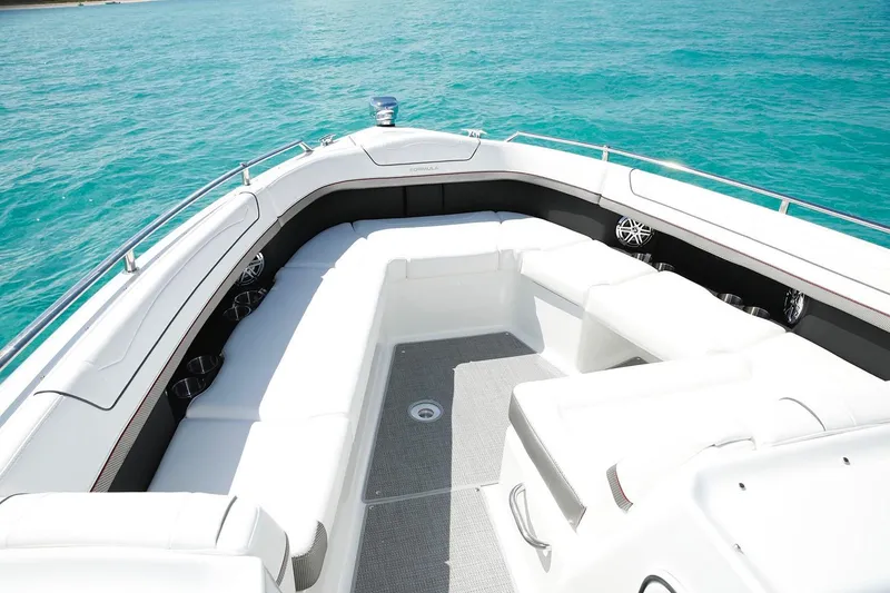 Slide: The Image of Manufacturer Provided Image: 2026 Formula 350 Crossover Bowrider I/O on turquoise water, featuring spacious seating. - 36