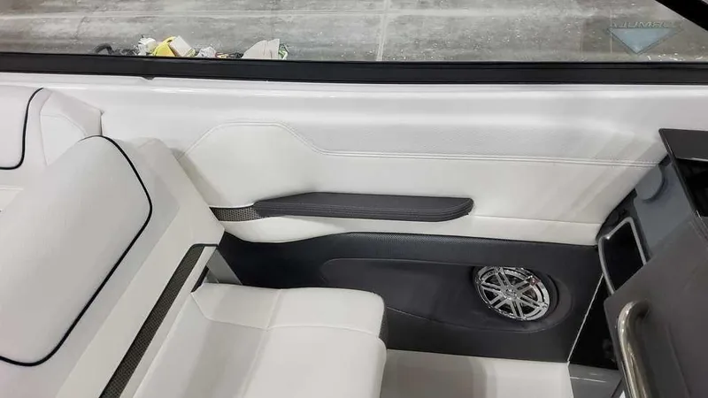 Slide: The Image of Interior of 2025 Formula 240 Bowrider with sleek white seating and modern design. - 18