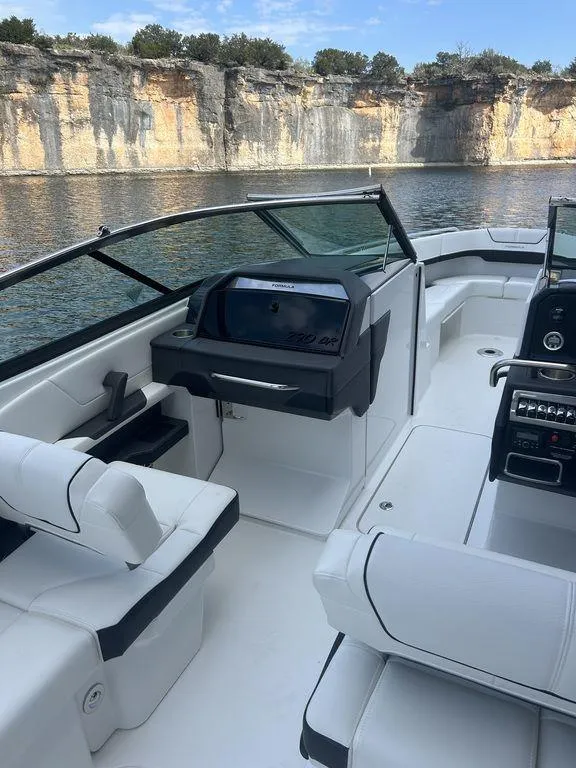 Slide: The Image of 2025 Formula 290 Bowrider boat interior with modern dashboard and steering wheel. - 20