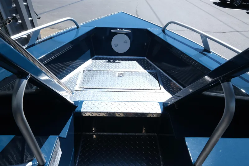 Slide: The Image of 2025 Hewescraft 210 Sea Runner ET boat interior with diamond plate flooring. - 13