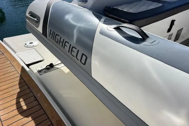 Slide: The Image of Highfield inflatable boat on 1997 Sea Ray 450 Sundancer yacht deck. - 15