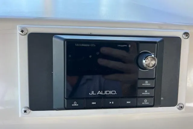 Slide: The Image of JL Audio system on 1997 Sea Ray 450 Sundancer yacht dashboard. - 20