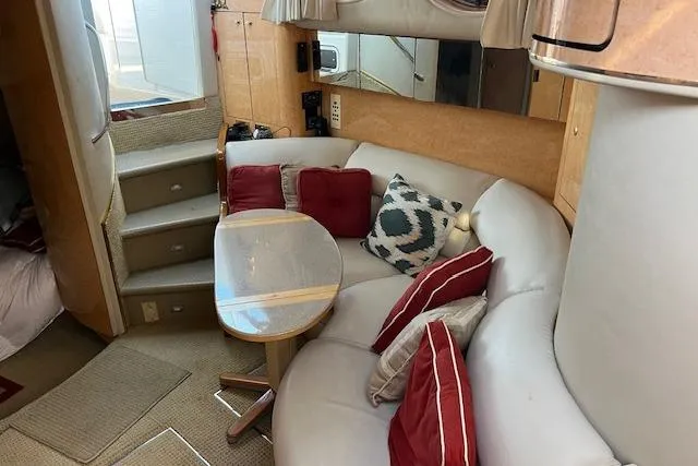 Slide: The Image of Luxurious interior of 1997 Sea Ray 450 Sundancer with plush seating and stylish decor. - 41