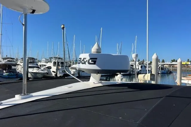 Slide: The Image of Radar equipment on 1997 Sea Ray 450 Sundancer yacht at marina. - 48