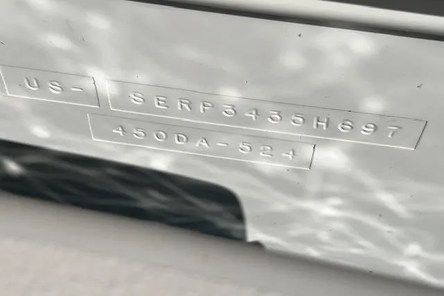 Slide: The Image of 1997 Sea Ray 450 Sundancer hull identification number on boat exterior. - 59