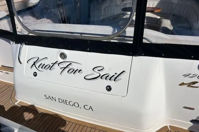 Slide: The Image of Sea Ray 450 Sundancer 1997 yacht named "Knot For Sail" docked in San Diego. - 9