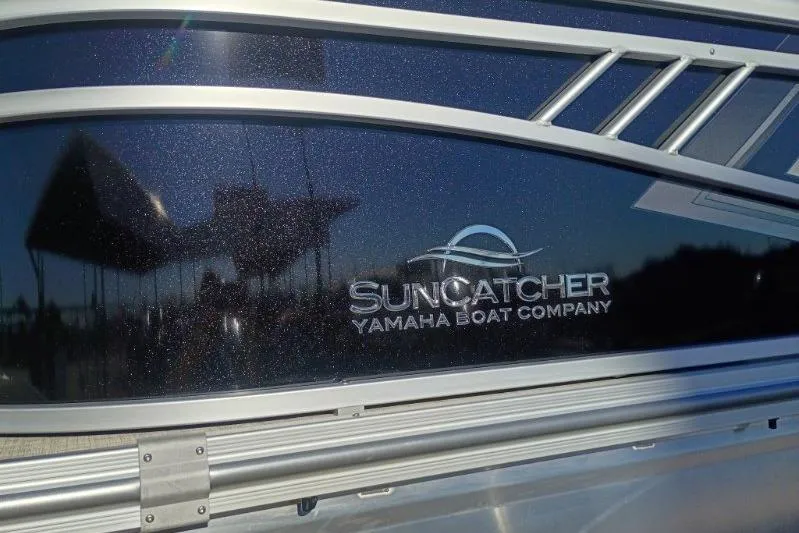 Slide: The Image of 2026 SunCatcher Select 20RC boat by Yamaha Boat Company, sleek design detail. - 4