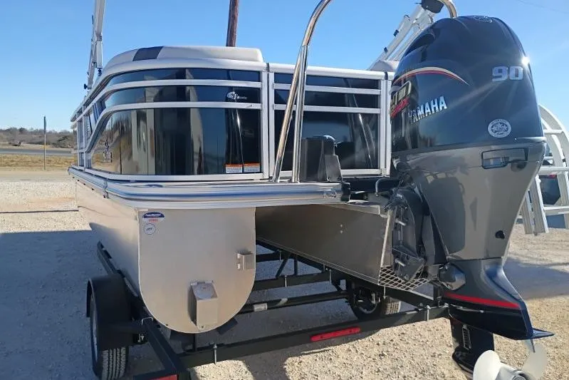 Slide: The Image of 2026 SunCatcher Select 20RC pontoon boat with Yamaha 90 engine on trailer. - 7