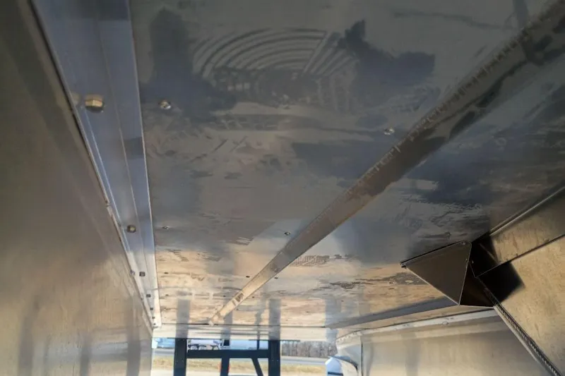 Slide: The Image of Underside view of 2026 SunCatcher Select 20RC boat, showcasing structural details. - 9