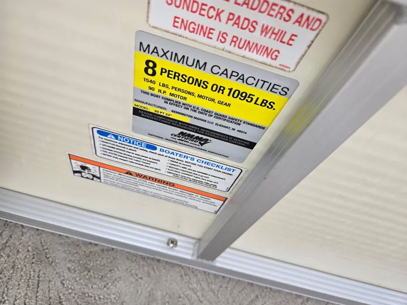 Slide: The Image of Capacity label on 2007 Bennington 2075GL boat, indicating 8 persons or 1095 lbs limit. - 20