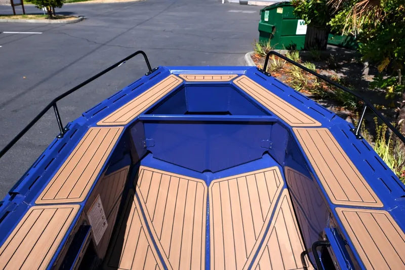Slide: The Image of Blue Fish Whistle FW109 boat interior with wood accents, 2023 model. - 9