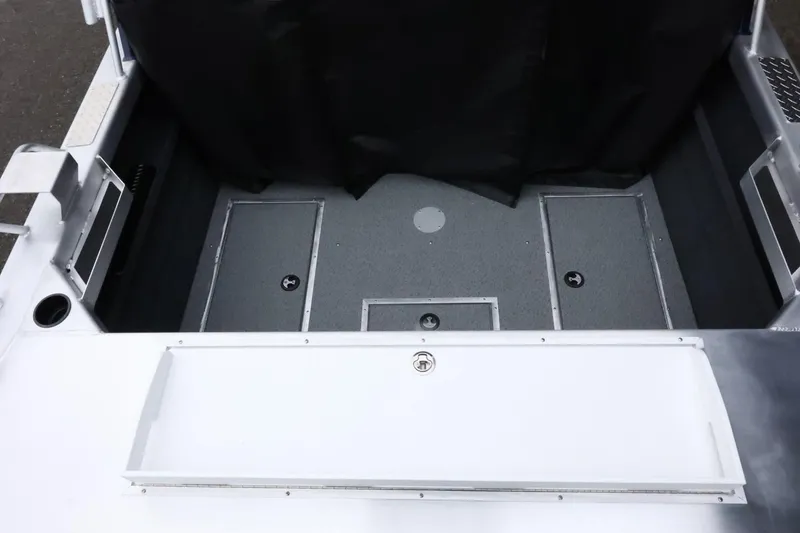 Slide: The Image of 2026 Thunder Jet 185 Luxor boat interior with storage compartments and sleek design. - 11