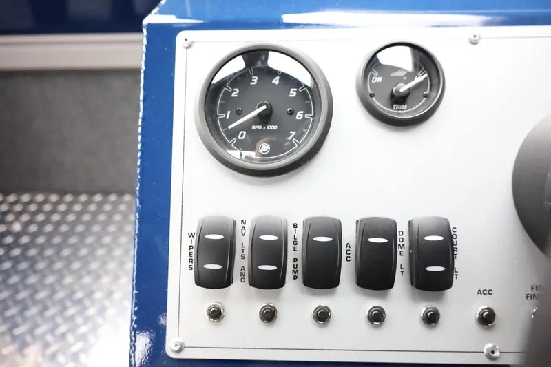 Slide: The Image of Control panel of 2026 Thunder Jet 185 Luxor boat with gauges and switches. - 22