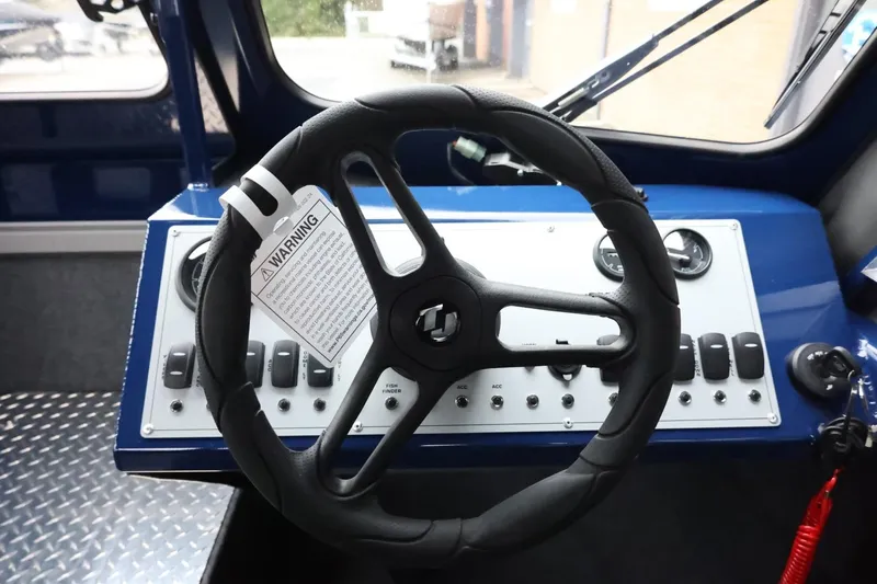 Slide: The Image of Steering wheel and dashboard of 2026 Thunder Jet 185 Luxor boat. - 25