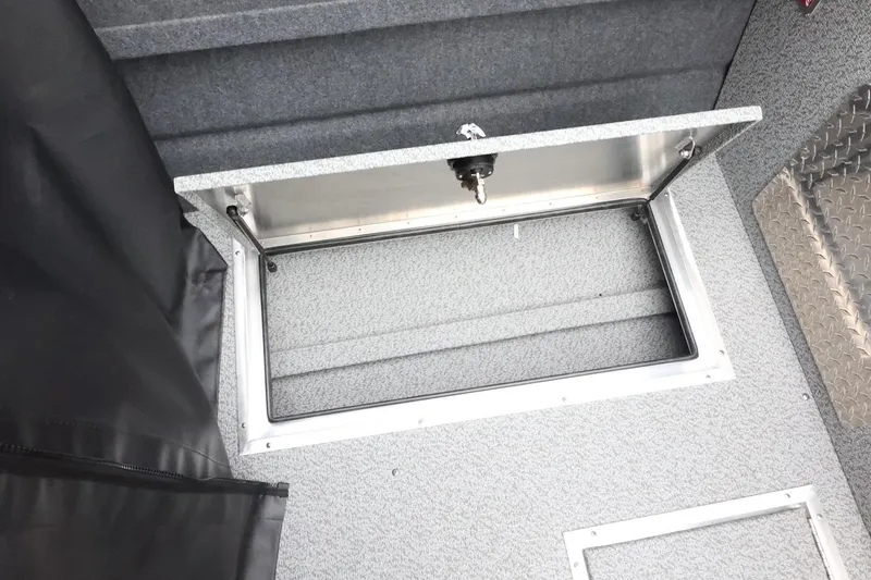 Slide: The Image of Open storage compartment in 2026 Thunder Jet 185 Luxor boat interior. - 32