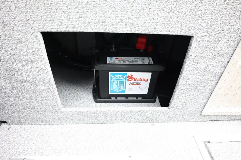 Slide: The Image of Battery compartment of 2026 Thunder Jet 185 Luxor boat, featuring a Sterling battery. - 38