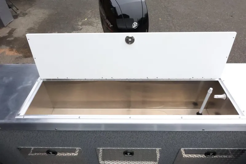 Slide: The Image of Open storage compartment on 2026 Thunder Jet 185 Luxor boat. - 39