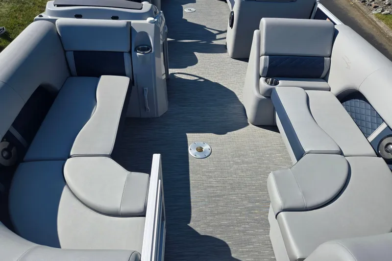 Slide: The Image of 2022 Bennington L 22 Quad Bench interior with luxurious seating and modern design. - 11