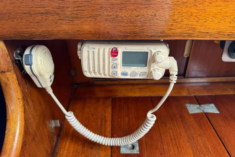 Slide: The Image of Vintage marine radio on 1960 Alden Challenger 38 sailboat, featuring Icom VHF Marine IC-M402. - 19