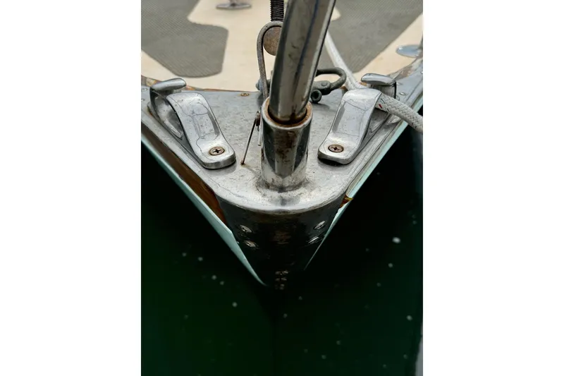 Slide: The Image of Bow of 1960 Alden Challenger 38 sailboat with metal fittings and ropes. - 5