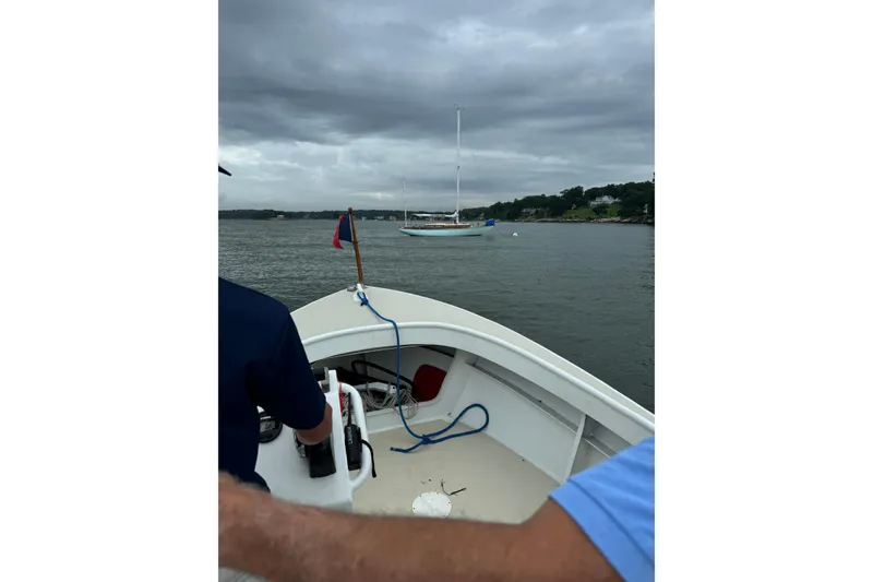 Slide: The Image of Boat on water with overcast sky, featuring Alden Challenger 38, 1960 model. - 8