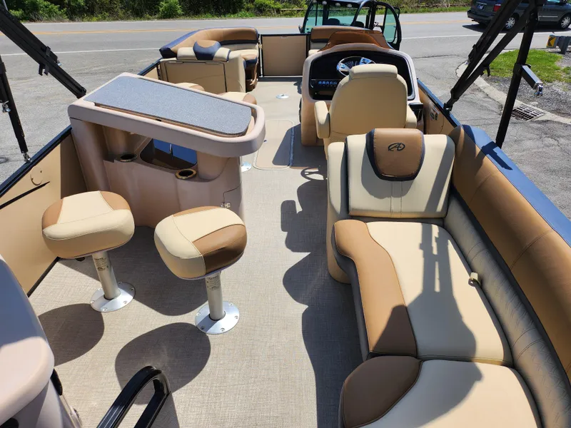 Slide: The Image of 2021 Avalon Catalina Platinum Entertainer Funship interior with luxurious seating and helm. - 23