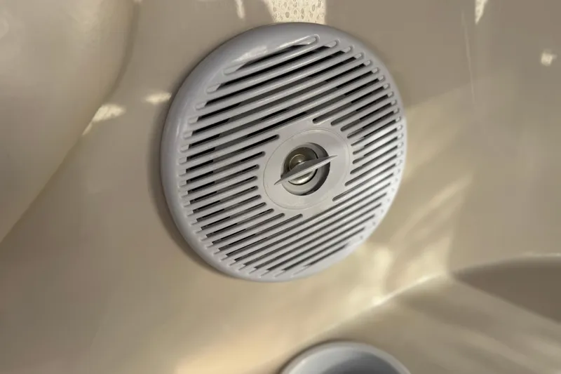 Slide: The Image of Close-up of a speaker on a 2004 Glastron GX 235 boat. - 19