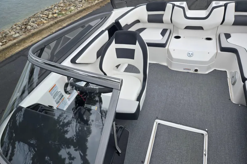 Slide: The Image of 2019 Yamaha Boats AR195 interior with sleek seating and modern dashboard design. - 21