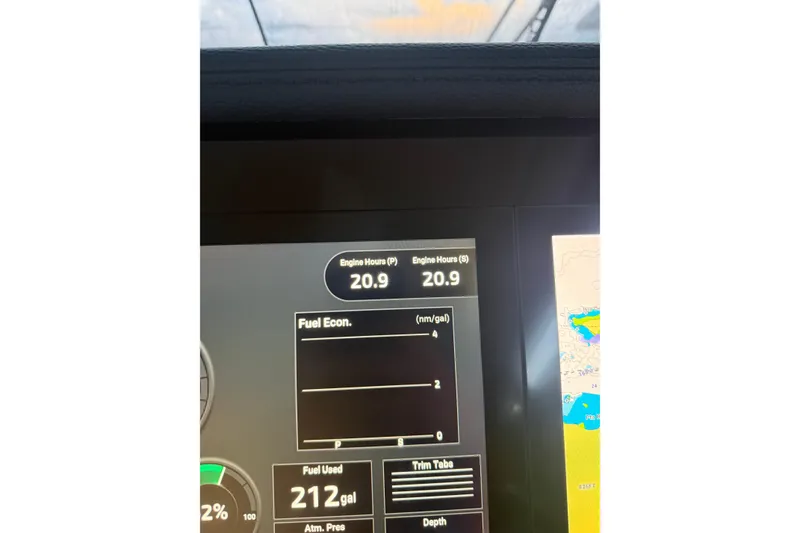 Slide: The Image of Dashboard of 2025 Regal 36 XO showing engine hours and fuel economy. - 23