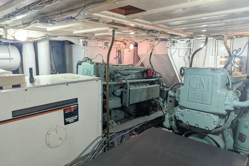 Slide: The Image of Engine room with GM diesel engines and generator, 1954 Grebe Sedan. - 30