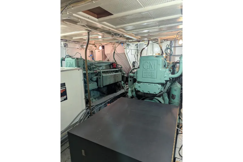 Slide: The Image of Engine room of a 1954 Grebe Sedan with GM diesel power units. - 31