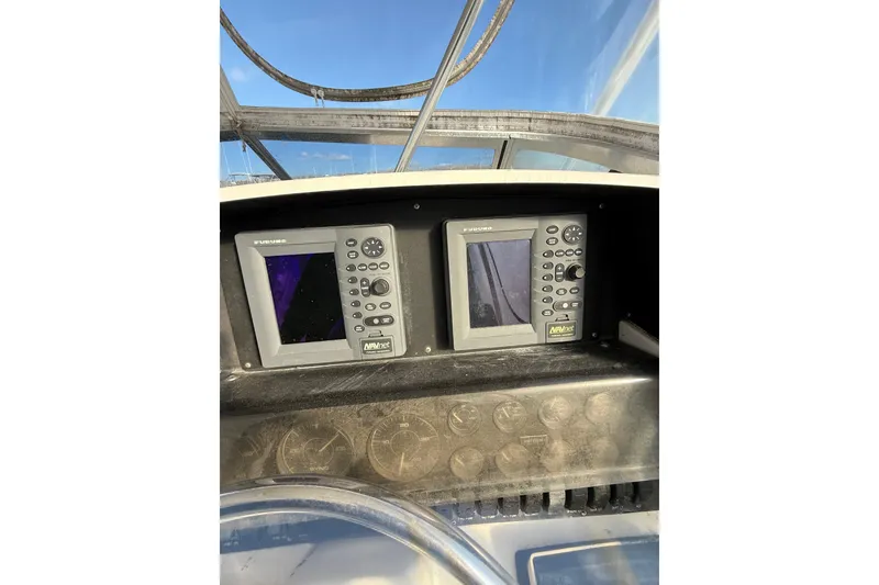Slide: The Image of Dashboard of a 1995 Blackfin 31 Combi boat with Furuno navigation displays. - 17