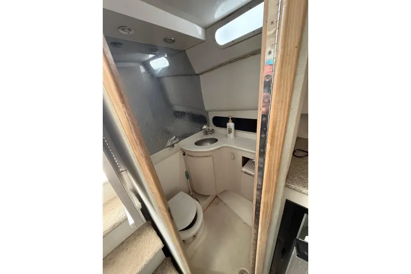 Slide: The Image of Interior view of a 1995 Blackfin 31 Combi yacht bathroom. - 37