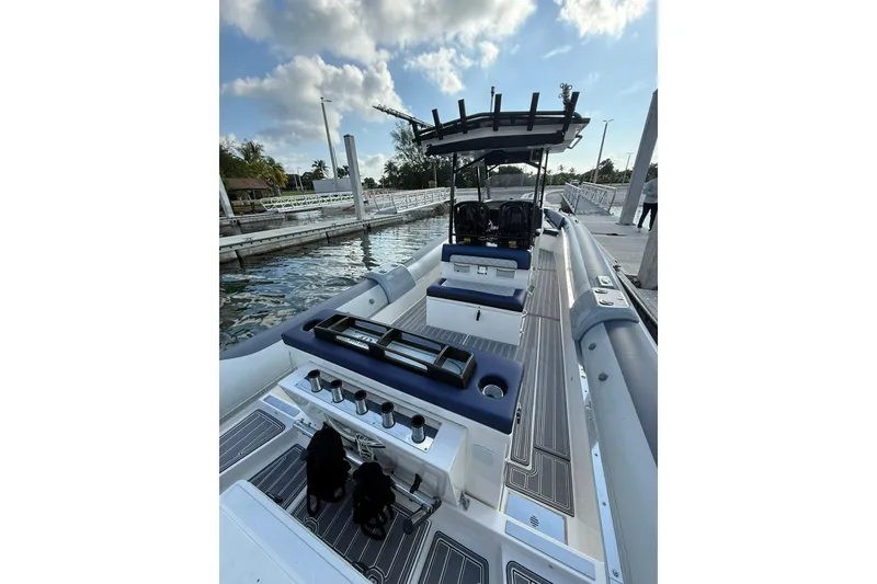 Slide: The Image of 2018 RIB CVL Colt 35 boat docked, featuring sleek design and modern controls. - 21