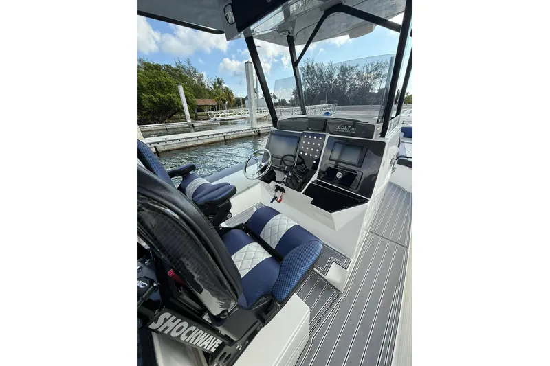 Slide: The Image of 2018 RIB CVL Colt 35 boat interior with modern dashboard and seating. - 29