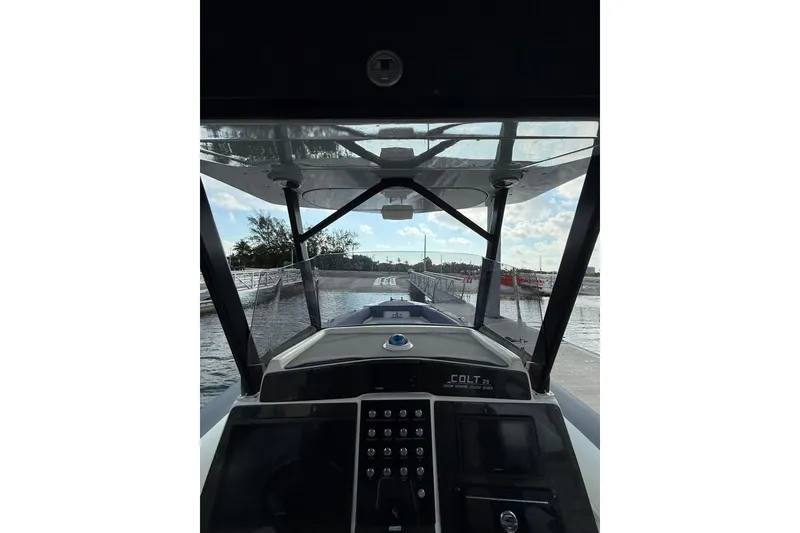 Slide: The Image of Cockpit view of 2018 RIB CVL Colt 35 boat, featuring modern controls and clear canopy. - 36