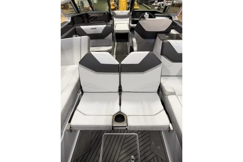 Slide: The Image of 2026 MasterCraft XStar 25 interior with modern seating and sleek design. - 13