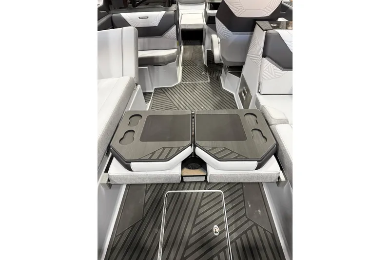 Slide: The Image of 2026 MasterCraft XStar 25 interior with sleek seating and modern design. - 14