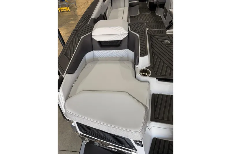 Slide: The Image of 2026 MasterCraft XStar 25 boat interior with sleek seating and modern design. - 16