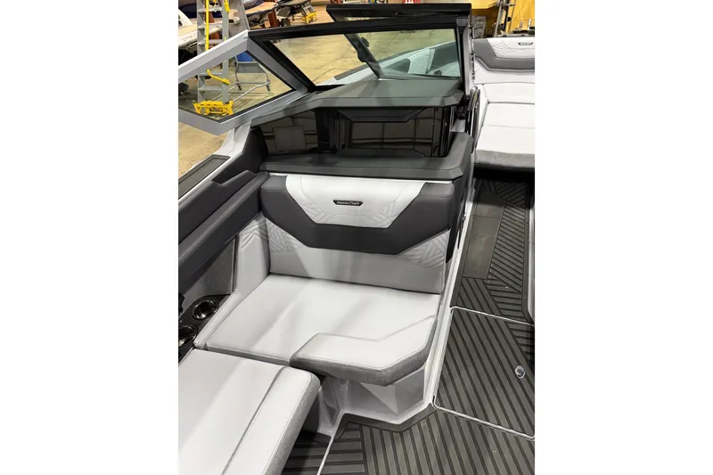 Slide: The Image of 2026 MasterCraft XStar 25 boat interior with sleek seating and modern design. - 9