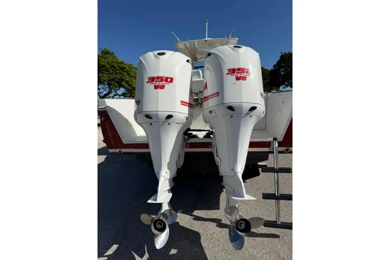 Slide: The Image of Twin Yamaha 350 V8 outboard engines on a 2006 Buddy Davis 34 Center Console boat. - 11