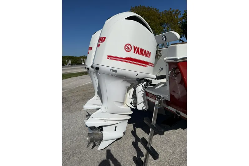 Slide: The Image of Twin Yamaha outboard engines on a 2006 Buddy Davis 34 Center Console boat. - 13